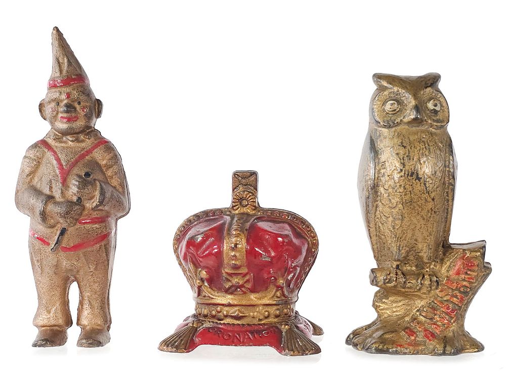 Lot 437: (3) Still Banks Owl, Clown, and Coronation Bank Cast Iron