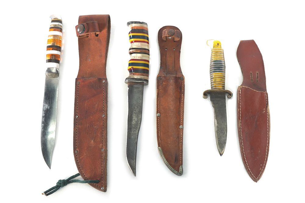 Lot 215: (3) WWII Theater Knives Plexiglass Handles w/Sheaths USN KABAR