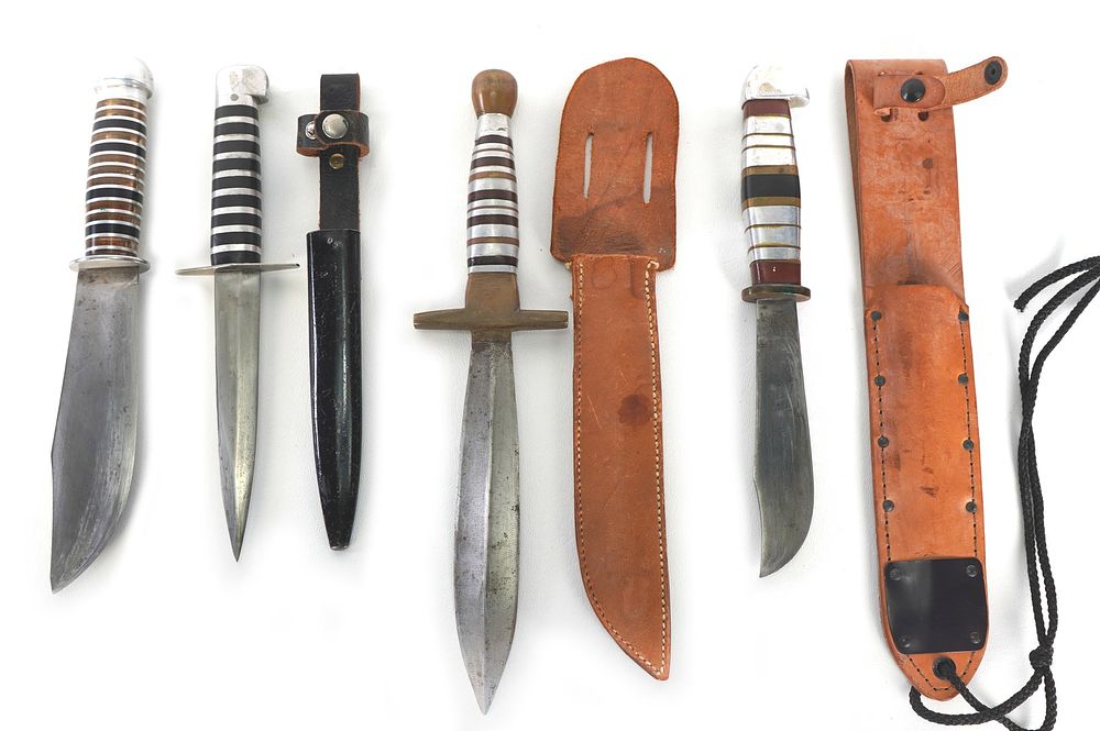 Lot 227: (4) WWII Theater Knives Acrylic/Stainless/Aluminum Handles Including Sheaths