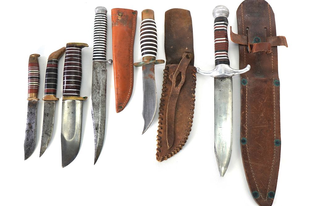 Lot 235: (6) WWII Theater Knives Brass & Aluminum Handles with Leather Sheaths