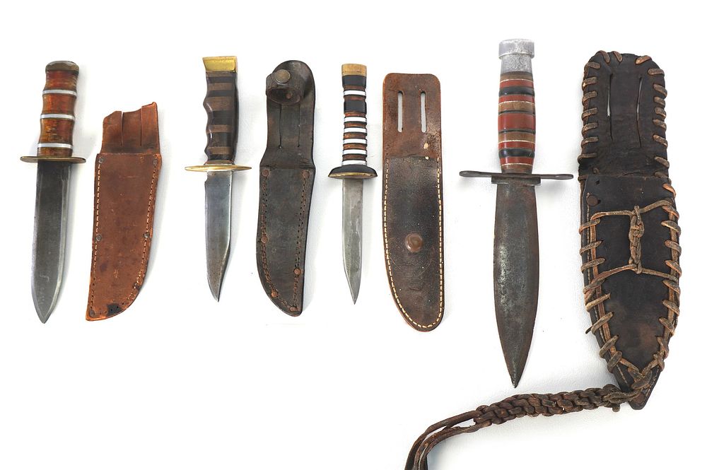 Lot 243: (4) WWII Theater Knives Mixed Handle with Sheaths