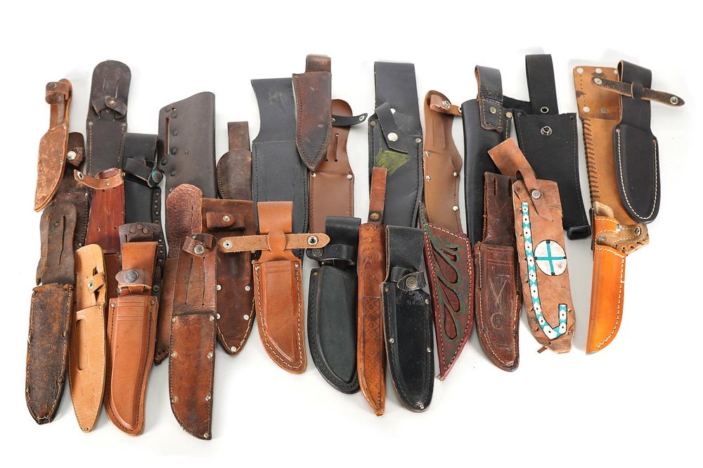 Lot 246: (31) Leather Knife Sheaths Assorted Sizes