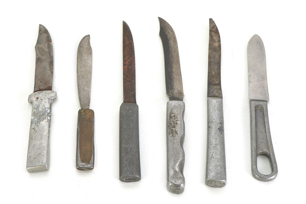 Lot 257: (6) WWII Theater Knives Brass & Aluminum Handles