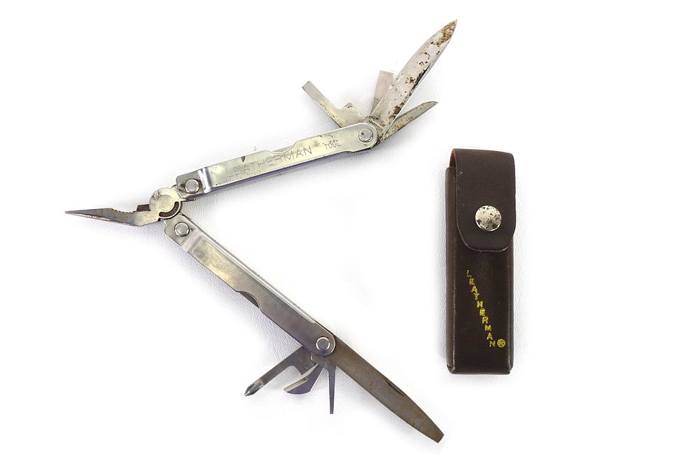 Lot 304: Rare Leatherman Tool Knife with Original Sheath