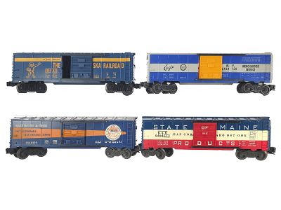 (4) Lionel Boxcars 6464 Assorted. An assortment of four Lionel 6464 series boxcars including 