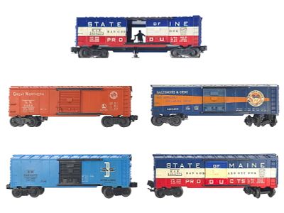 (5) Lionel Boxcars 6464 Assorted. A lot of five Lionel 6464 series boxcars including State of 