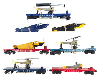 (5) Lionel Assorted Flat Cars w/Accessories. A lot of five assorted Lionel flat cars including 