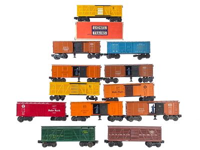 (12) Lionel Box Cars & Stock Cars Assorted. A lot of twelve Lionel boxcars and stock cars 