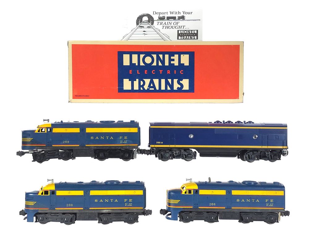Lot 246: (4) Lionel Santa Fe Assorted Blue & Yellow