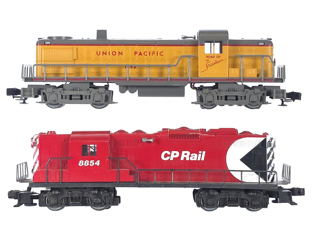 Lot 265: (2) Alco Union Pacific & Lionel CP Canadian Pacific Rail Engines