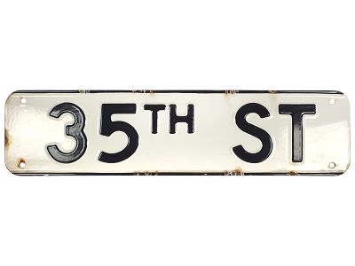 Porcelain 35th Street Sign. A single-sided steel 35th Street sign with four mounting holes. The 