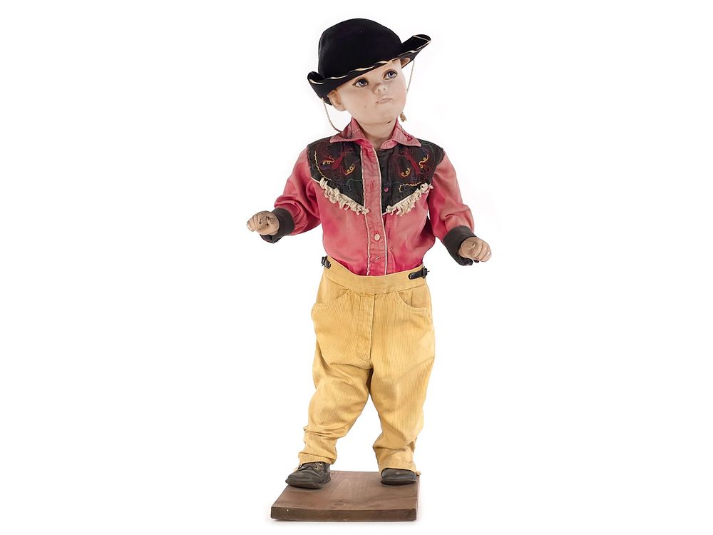 Lot 191: Vintage Cowboy Child Mannequin with Wooden Stand