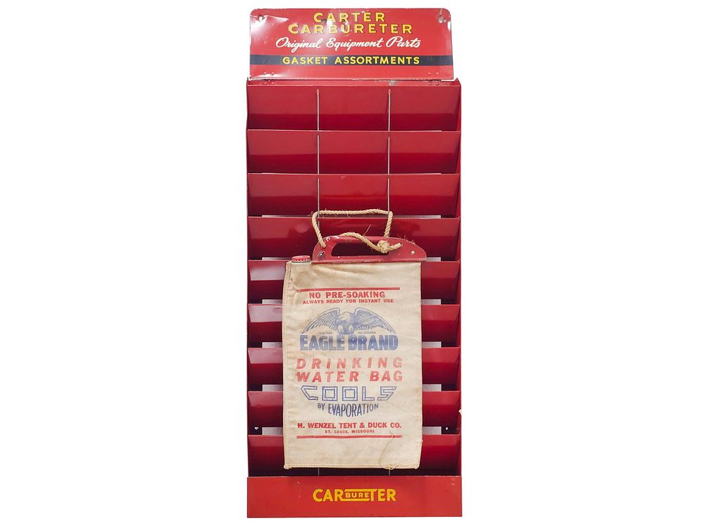 Lot 291: Steel Carter Carbureter's Display Stand & Eagle Brand Drinking Water Bag