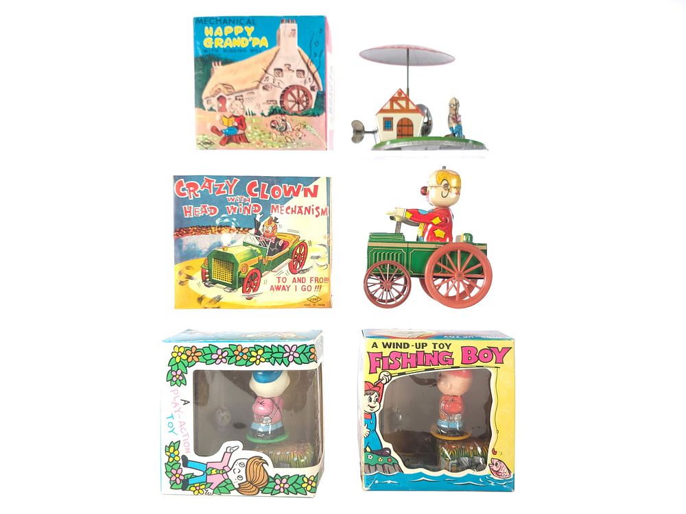 Lot 217: (4) Boxed Mechanical Windup Toys Assorted