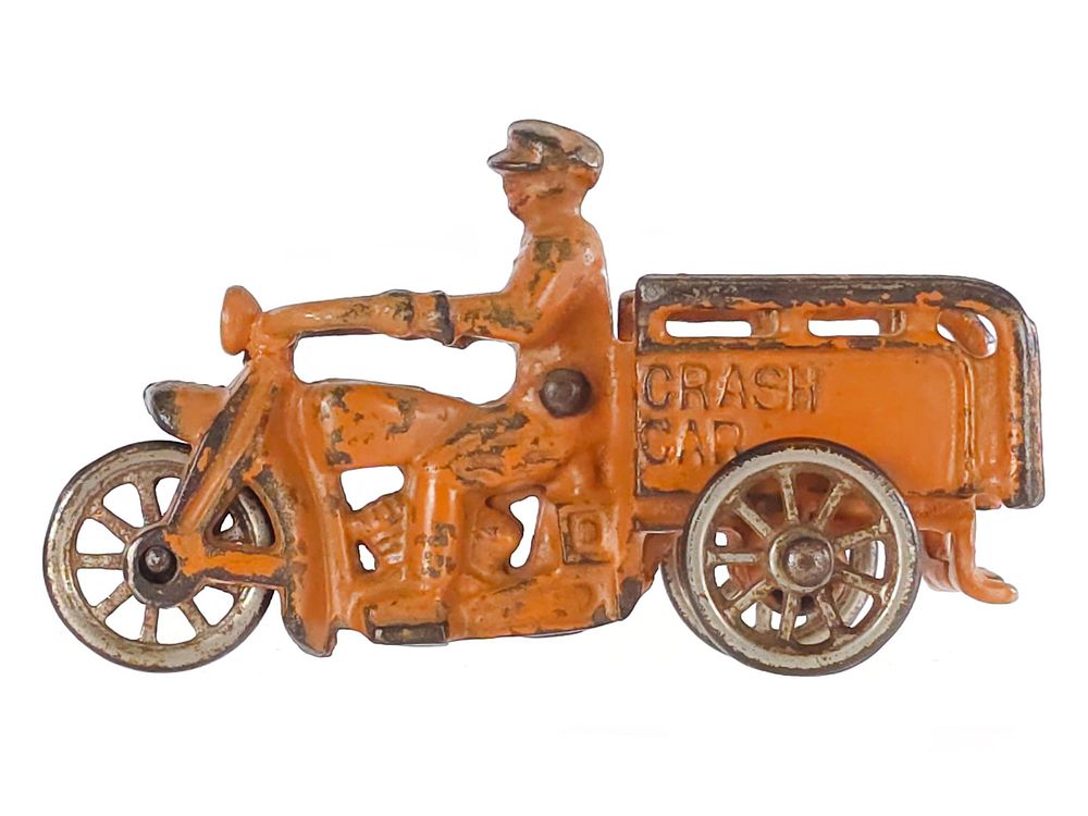 Lot 26B: Orange Crash Car Motorcycle in Cast Iron by Hubley