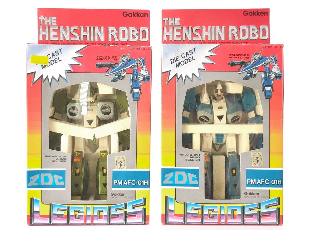 Lot 208: (2) Gakken Henshin Robo Mospeda PM AFC-01H Diecast Robots Boxed