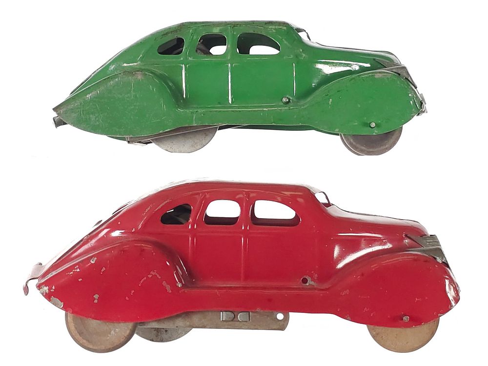 Lot 283: (2) Marx Mystery Cars Push Down
