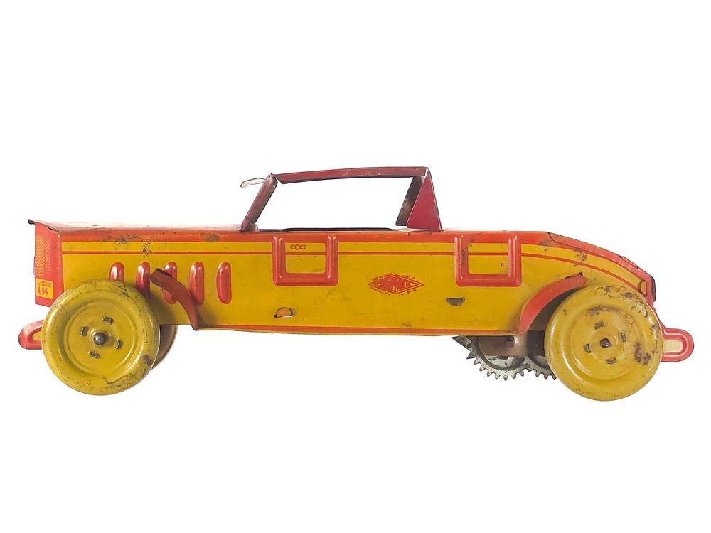 Lot 343: Nonpareil Windup Two-Door Coupe Car Tin Litho