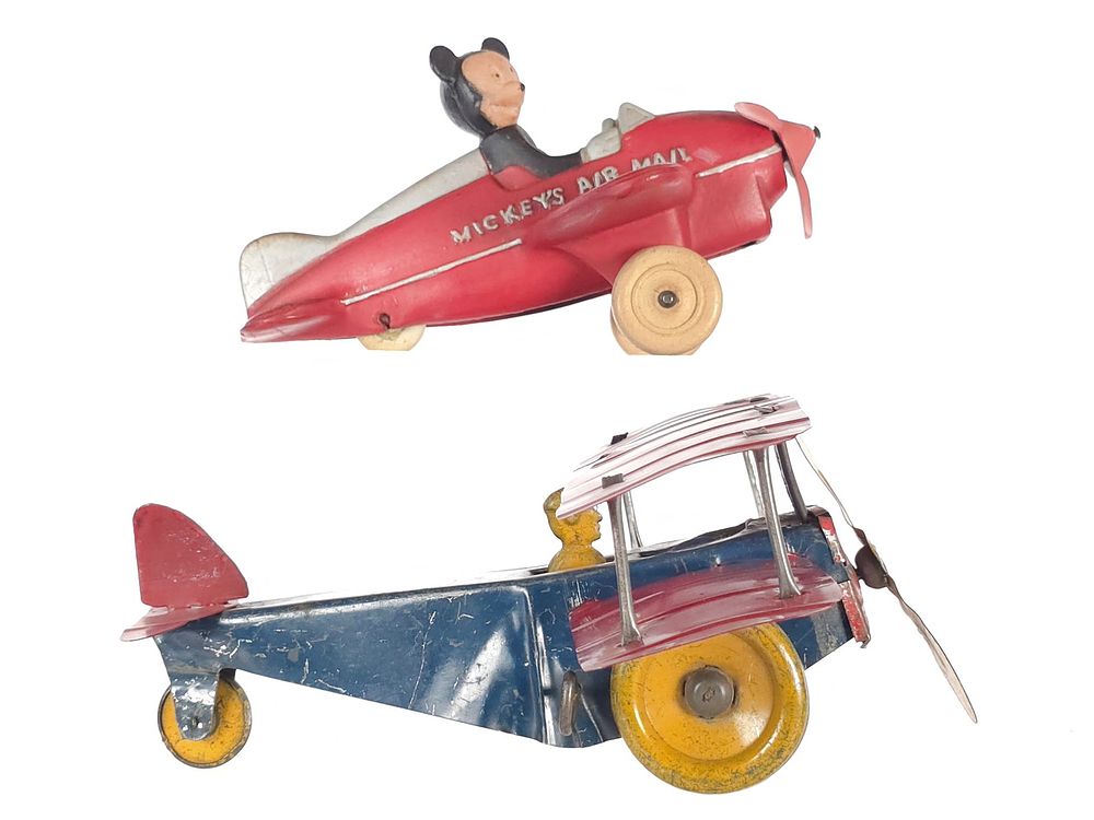 Lot 377: (2) Tin Windup Biplane & Sun Rubber Mickey Airmail Plane