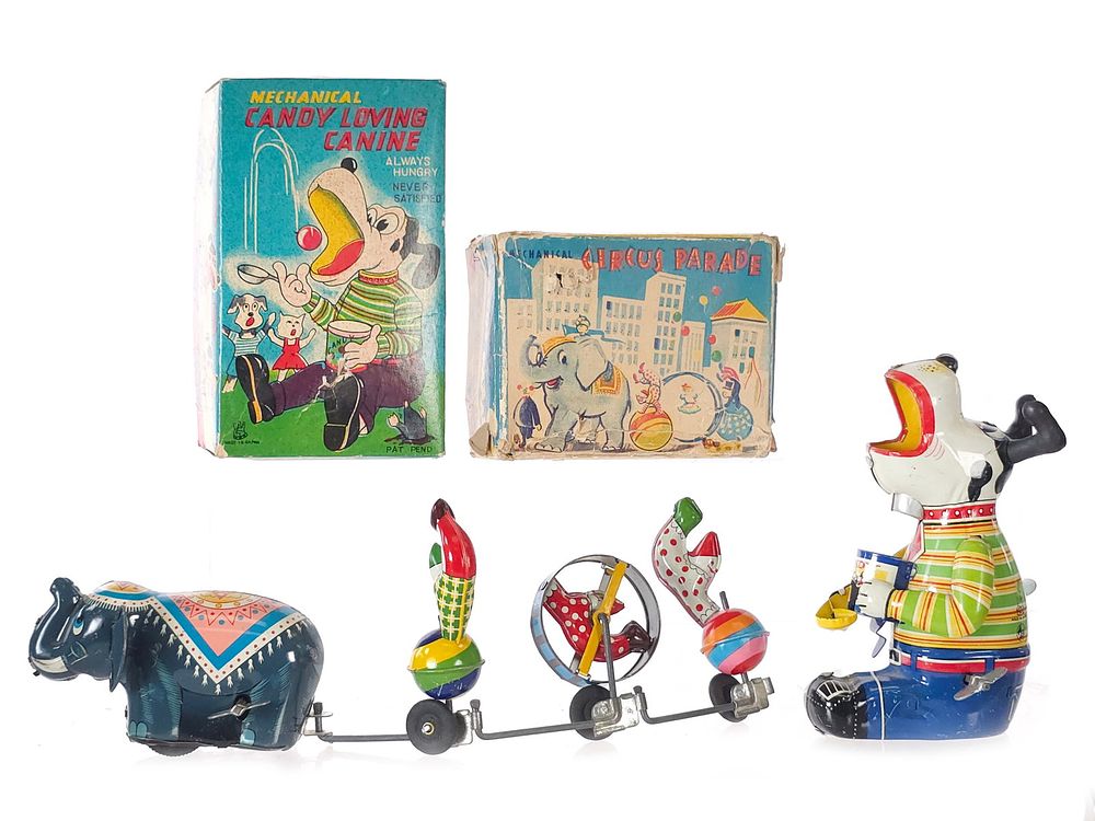 Lot 395: (2) TPS Candy Loving Canine & Circus Parade Tin Windups Boxed
