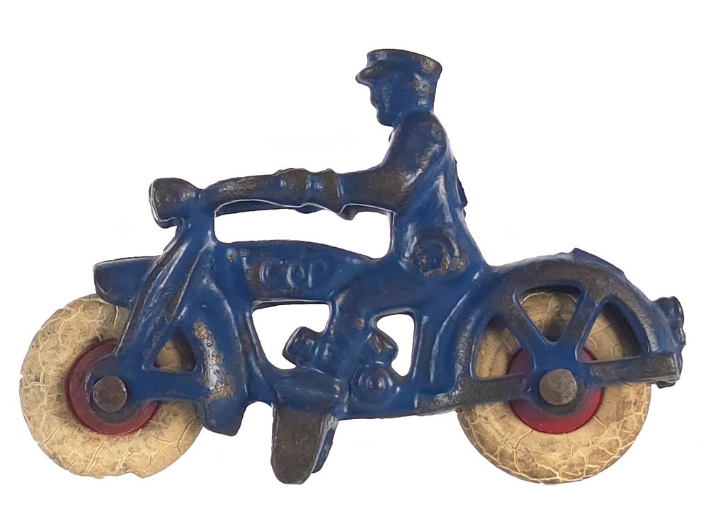 Lot 409: Hubley Small Blue Cop Cast Iron