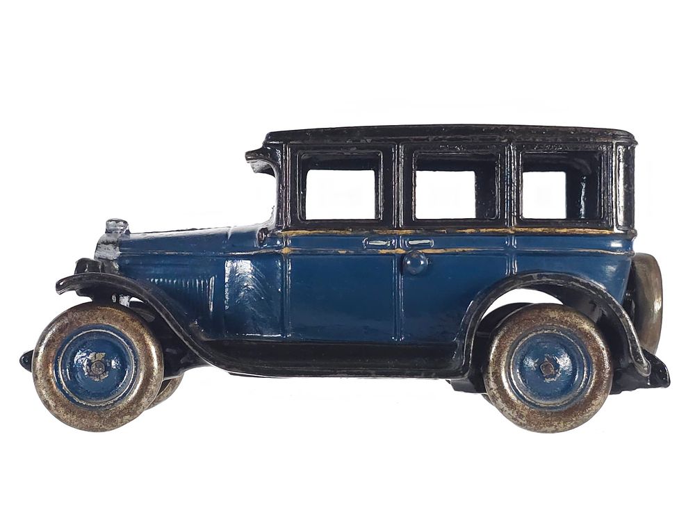 Lot 416: Arcade Toys Chevrolet Double Stripe Cast Iron Sedan