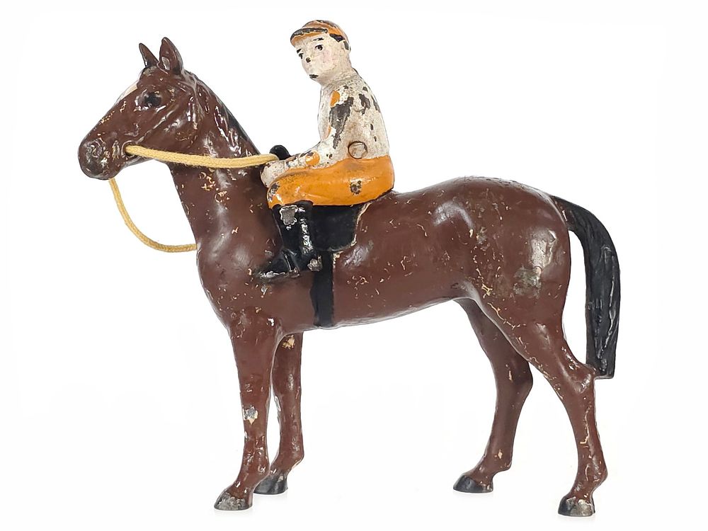 Lot 482: Hubley Brown Race Horse with White & Orange Jockey