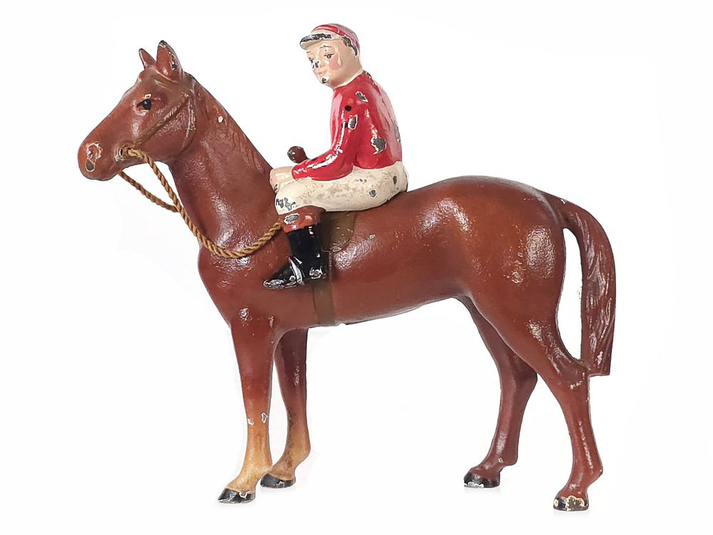 Lot 484: Hubley Light Brown Horse with Red & White Jockey