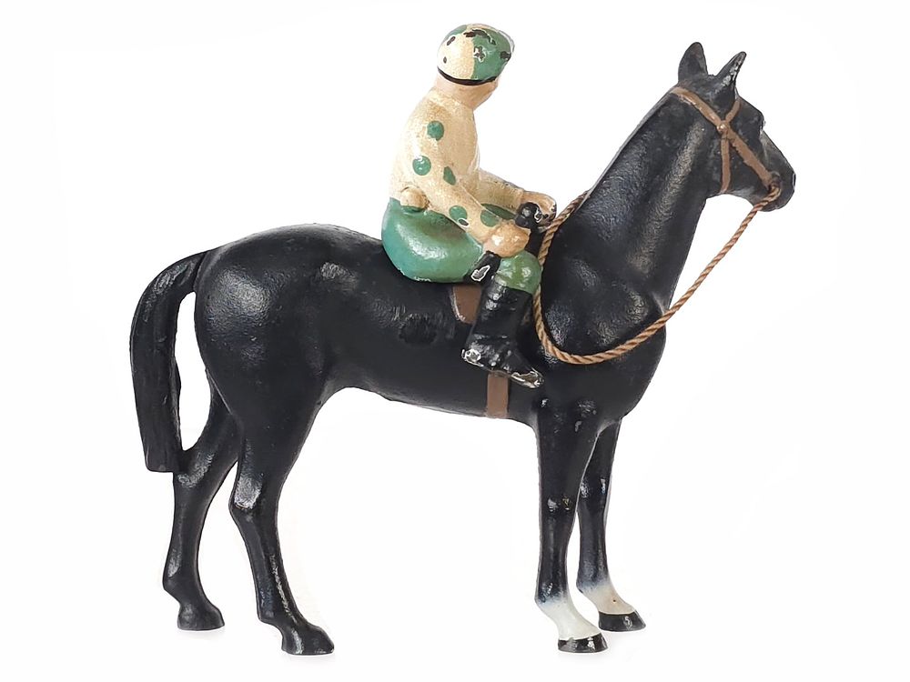 Lot 485: Hubley Black Race Horse with Green & White Jockey
