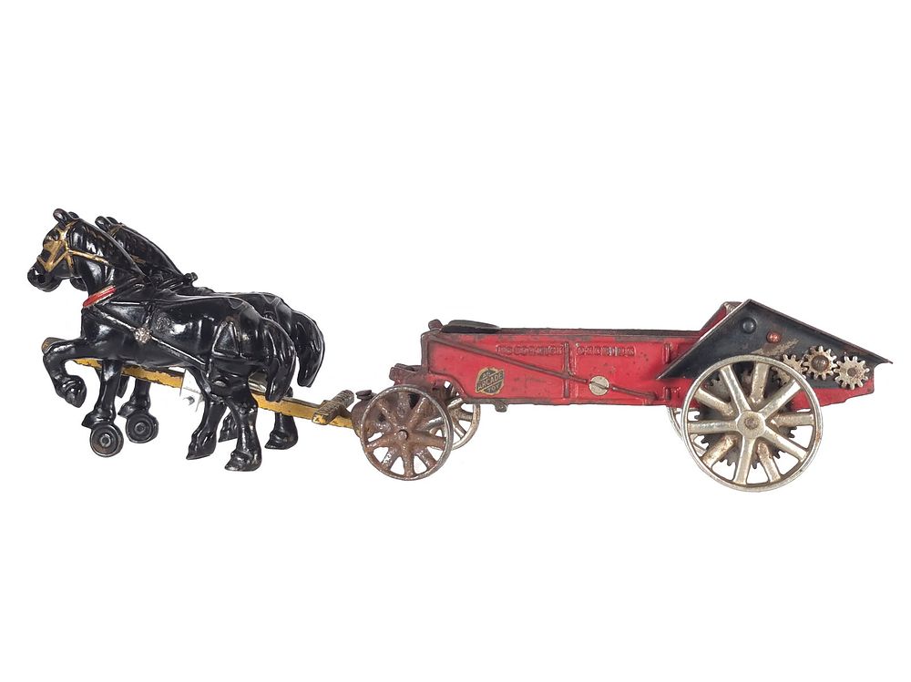 Lot 488: Arcade Toys Horse-Drawn McCormick-Deering Seed Spreader Cast Iron