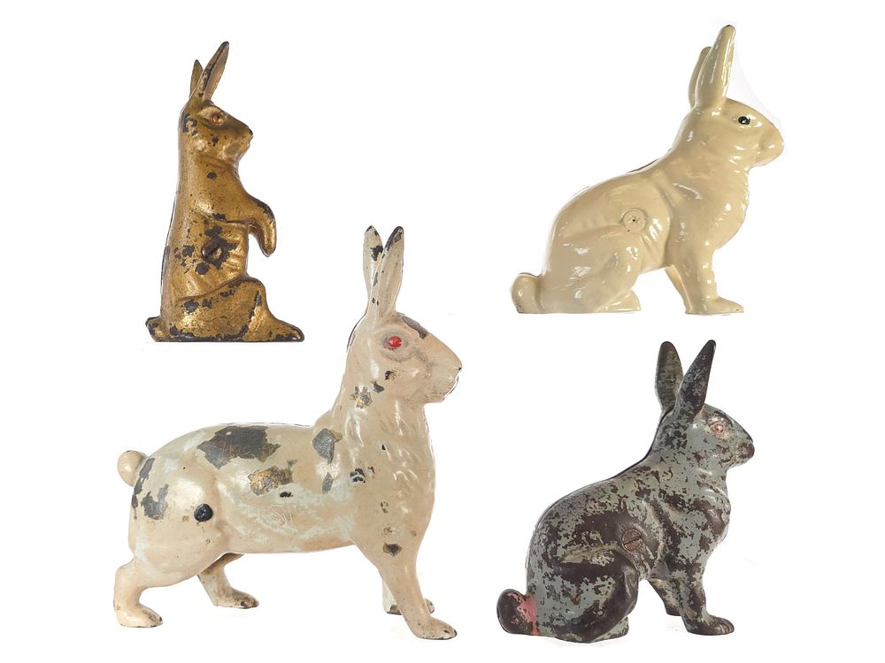 Lot 493: (4) Williams/Wing/Hubley Cast Iron Rabbit Banks
