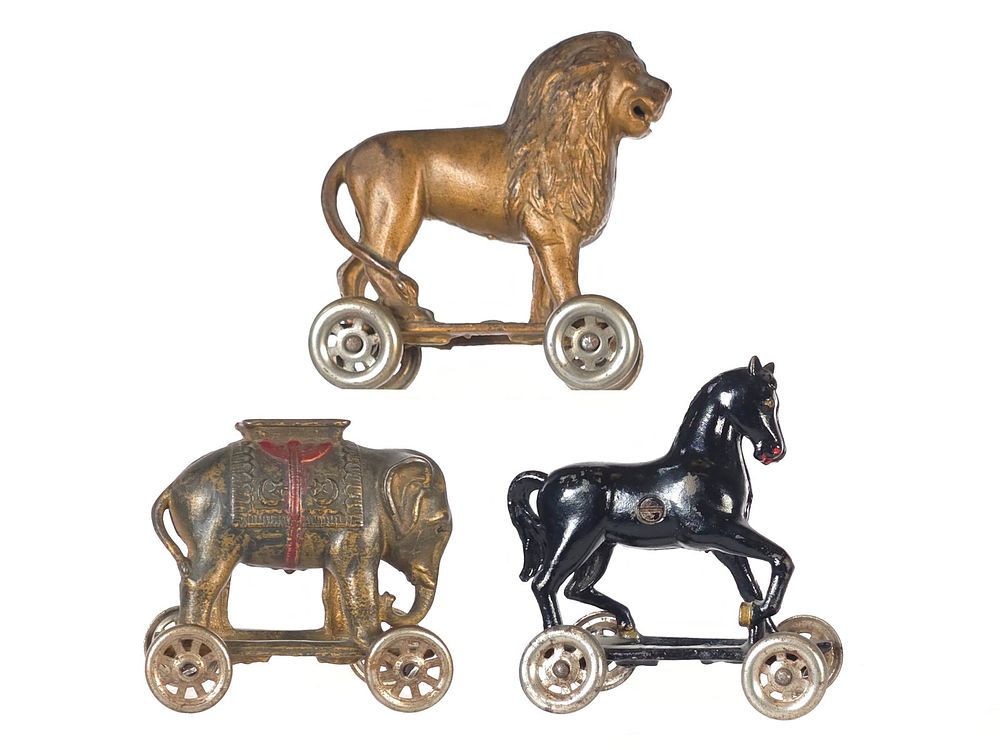 Lot 497: (3) A.C. Williams Cast Iron Animals on Wheels