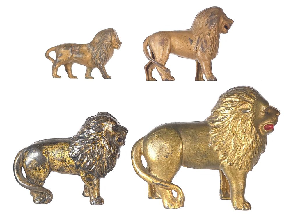 Lot 502: (4) A.C. Williams Cast Iron Tail Right Lion Banks