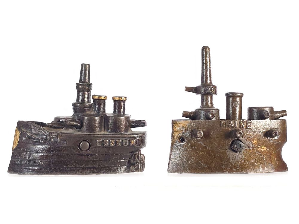 Lot 521: (2) Grey Iron Maine & J.E. Stevens Oregon Battleship Banks