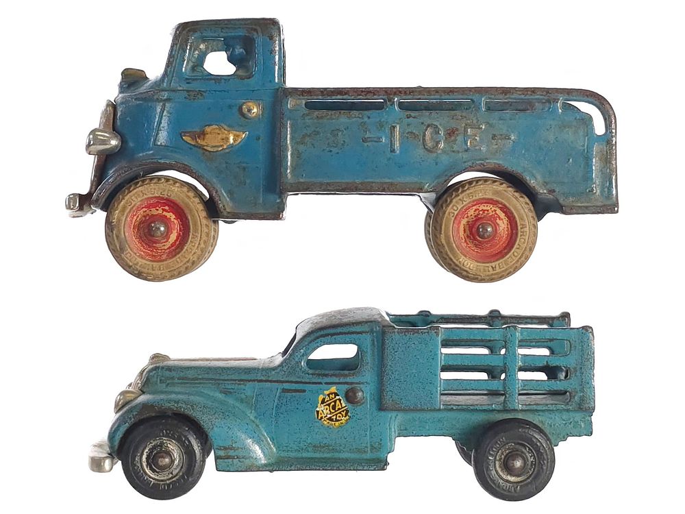 Lot 556: (2) Arcade Ice Truck & Blue Cast Iron Stake Truck