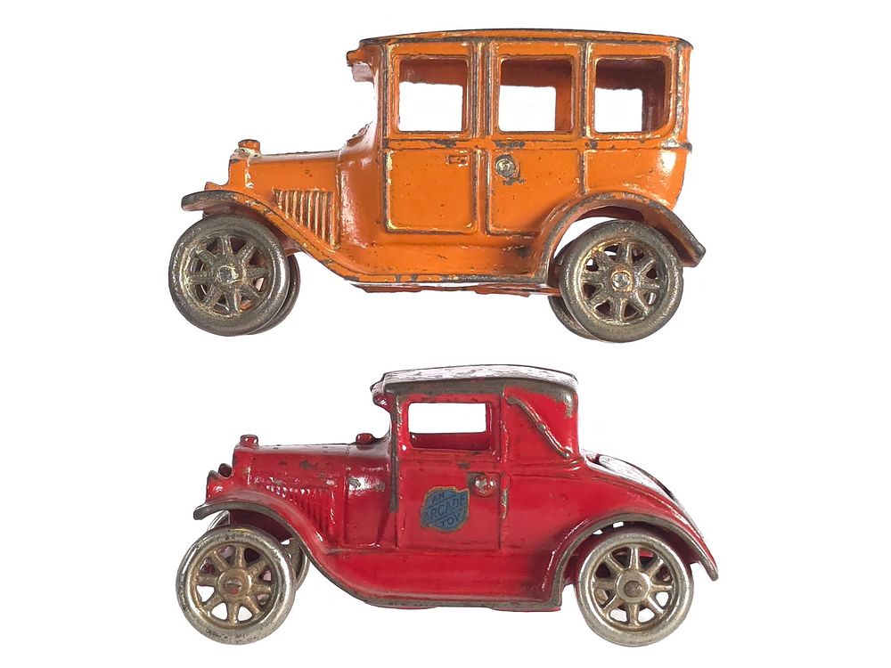 Lot 563: (2) Arcade Cast Iron Red & Orange Cars