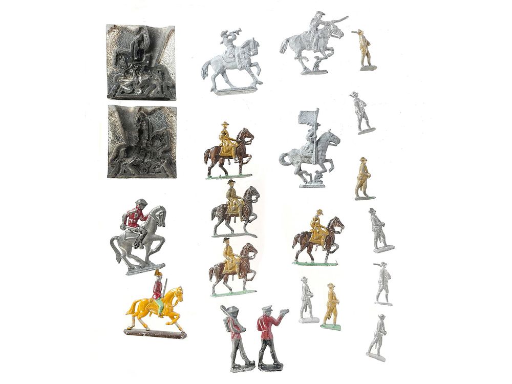 Lot 568: 1920s Soldier Lead Mold & Toys
