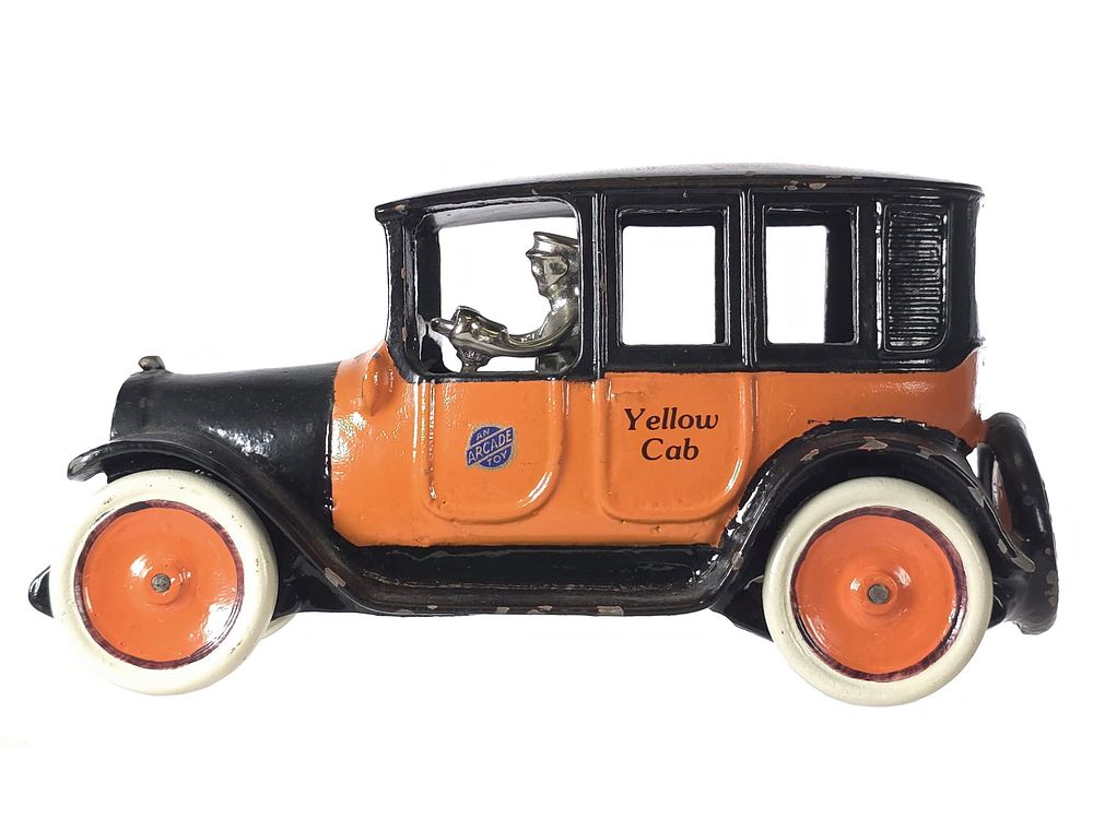 Lot 584: Orange & Black Yellow Taxi Cast Iron Car