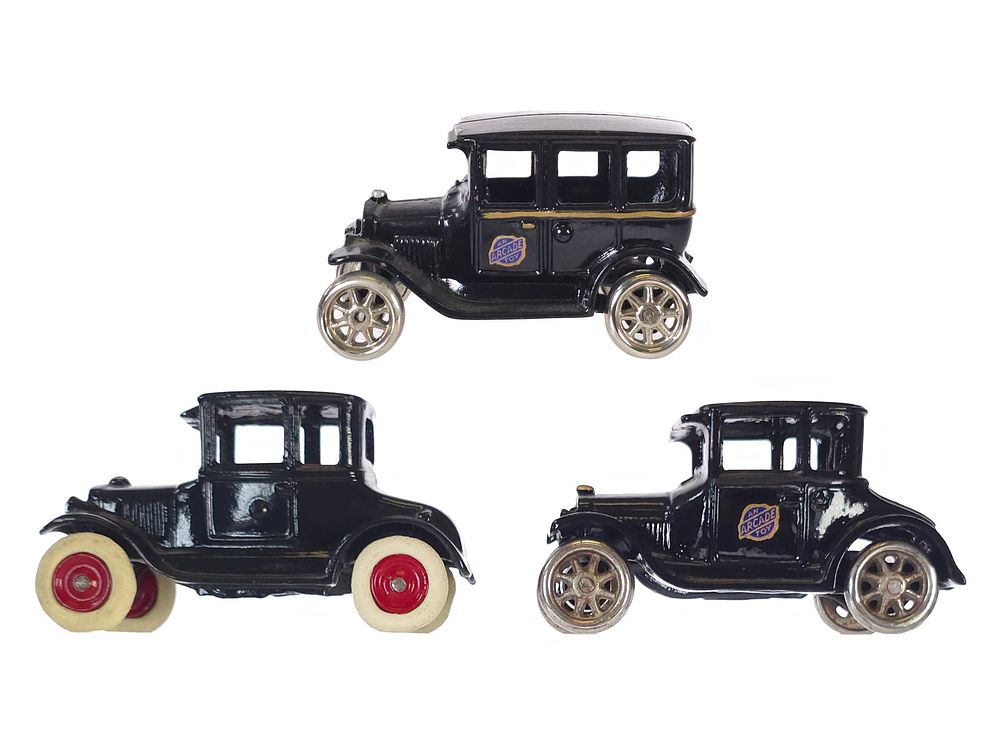 Lot 595: (3) Arcade Black Cast Iron Coupes