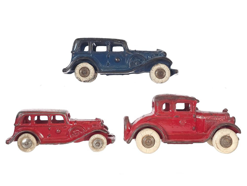 Lot 596: (3) A.C. Williams Cast Iron Cars