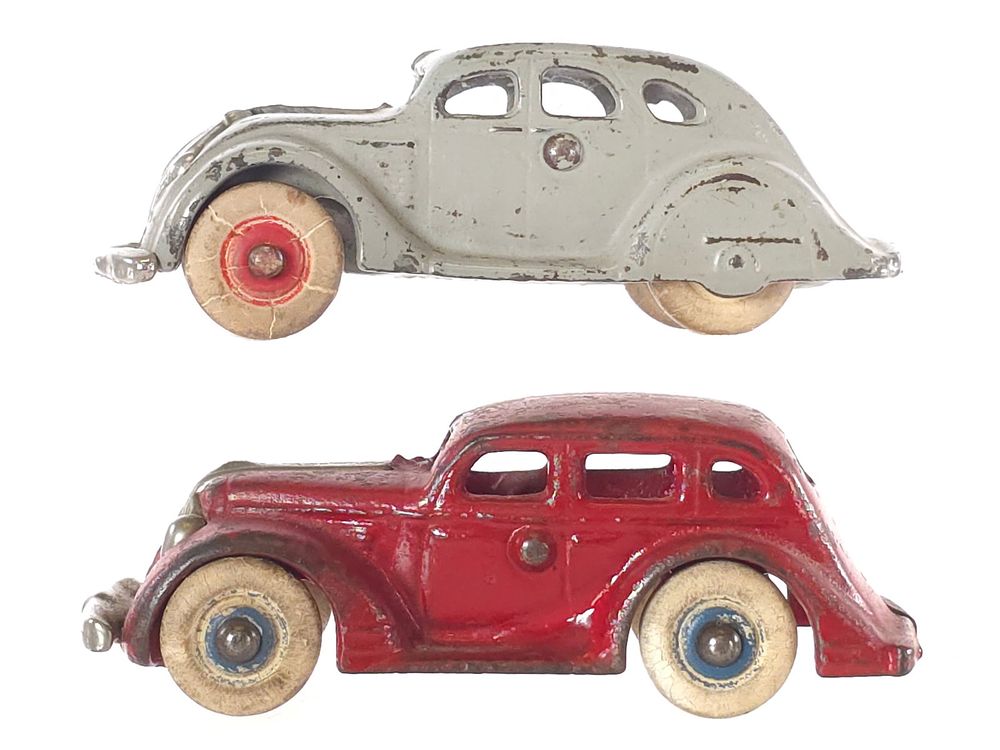 Lot 614: (2) Arcade Desoto & Pontiac Cast Iron Cars