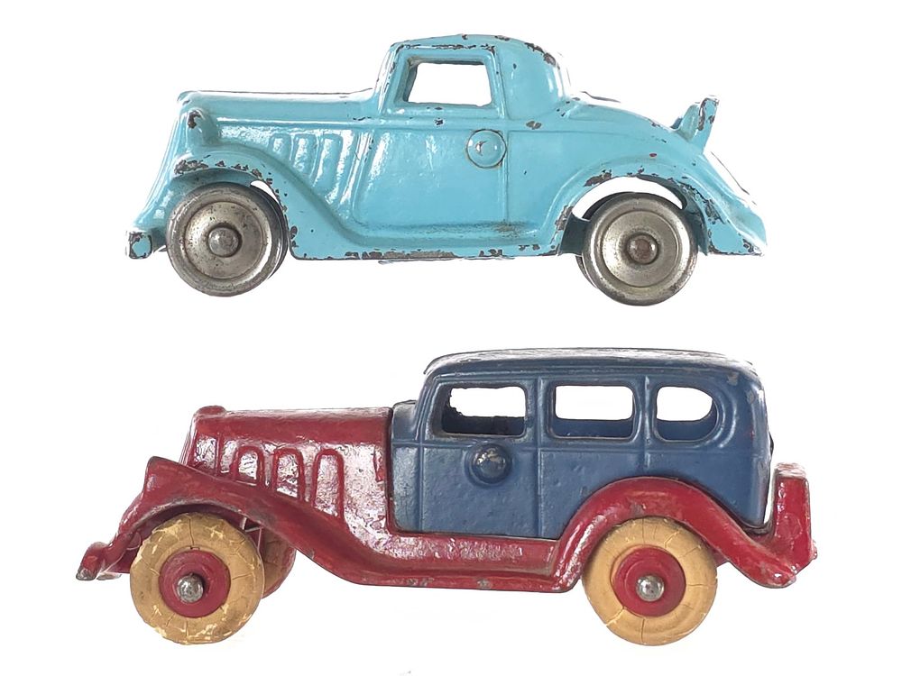 Lot 615: (2) Arcade Ford & Hubley Cast Iron Take-Apart Sedan