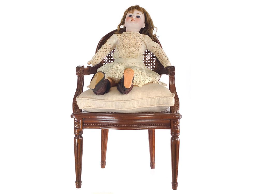 Lot 647: ca. 1900s S&H Bisque Head Doll 24" Tall with Wicker Chair