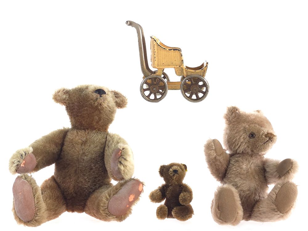 Lot 648: (3) Steiff Bears plus Kilgore Cast Iron Baby Carriage