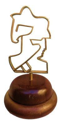 running. An especially impressive metal statue on a wooden base 
Height: 35 centimeters 