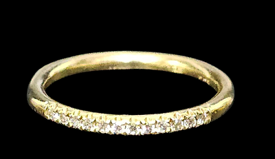 טבעת מזהב 14 קראט משובצת 12 יהלומים כל יהלום כ 1 נקודה , משקל הטבעת 1.45 גרם מידת הטבעת 4