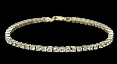 צמיד טניס מזהב 14 קראט משובץ זיקונים משקל 4.45 גרם אורך הצמיד 15.5 ס"מ