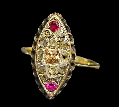 טבעת מזהב 14 קראט משובצת יהלומים בליטוש ישן [דיימנטים] ורובי, 
משקל הטבעת 3.13 גרם מידת הטבעת 9