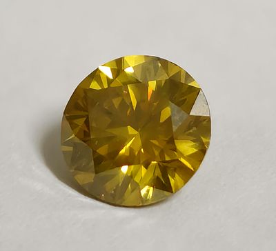 יהלום טבעי במשקל 1.14 קראט בגוון צהוב עמוק צבע משופר מצורף תעודה גמולוגית E.G.L ,