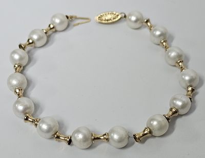 צמיד זהב 14 קראט משולב משולב פנינים אורך הצמיד 12 ס"מ , משקל 12 גרם , פריט זה הגיע מחו"ל